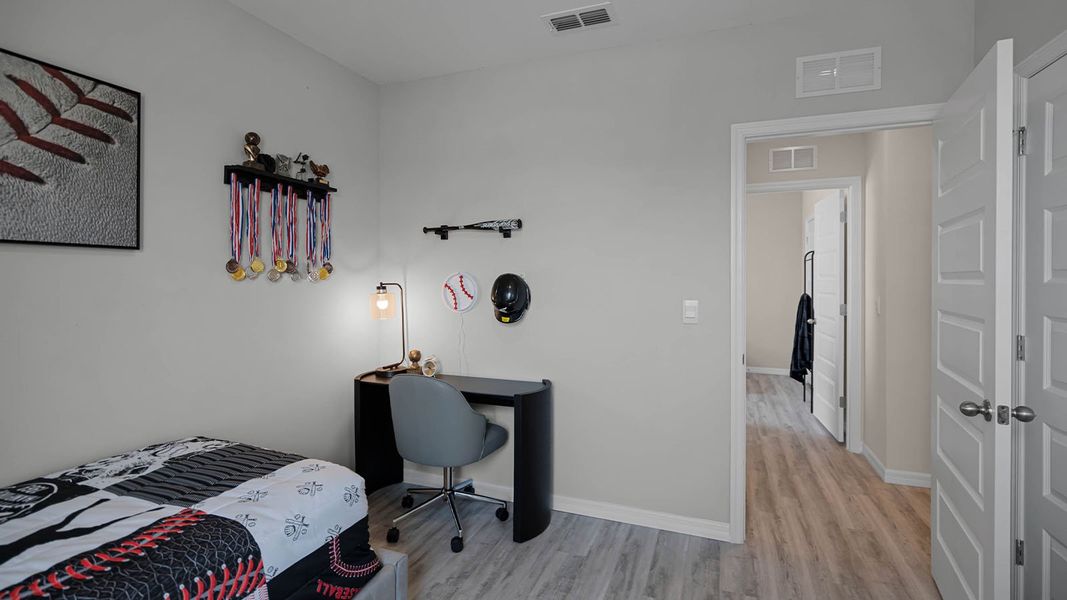 Furnished interior view inside a new home in Harmony at Lake Eloise, Winter Haven (Image 27).