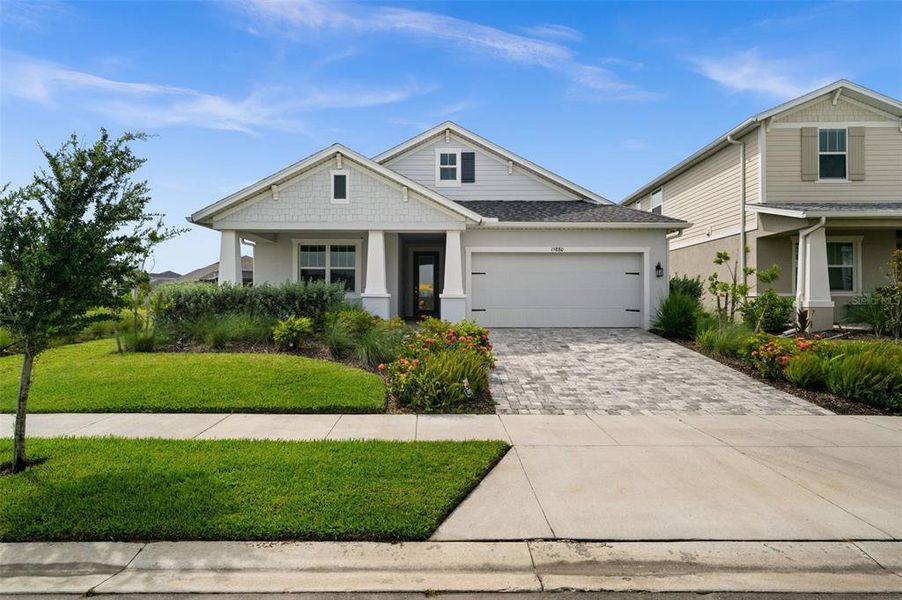 Front exterior of a new home in , Punta Gorda, FL, highlighting curb appeal (Image 23).