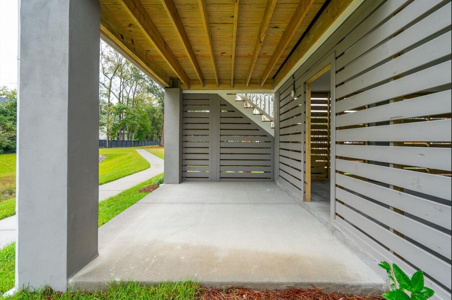 Exterior details and patio area of a home in Central Park, James Island (Image 20).