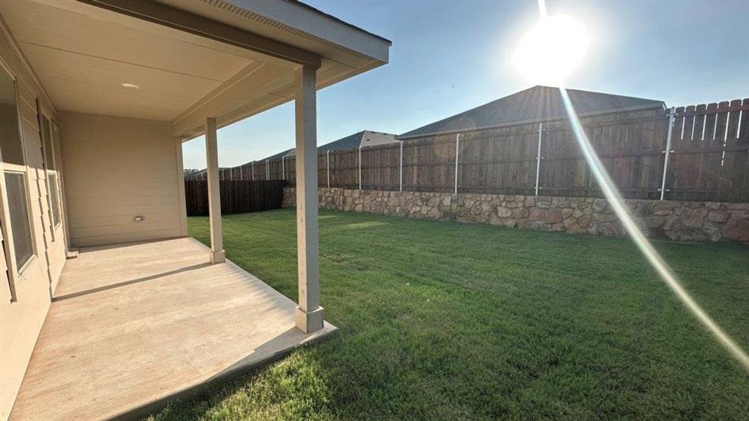 Exterior details and patio area of a home in Sandy Beach, Azle (Image 3).