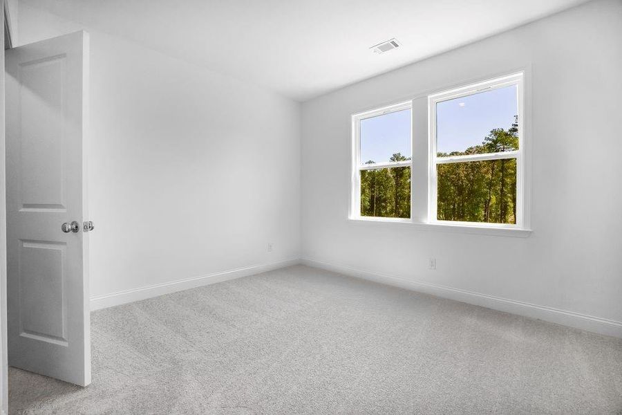 Spacious, unfurnished interior of a new home in Bailey Fence, Dacula (Image 27).