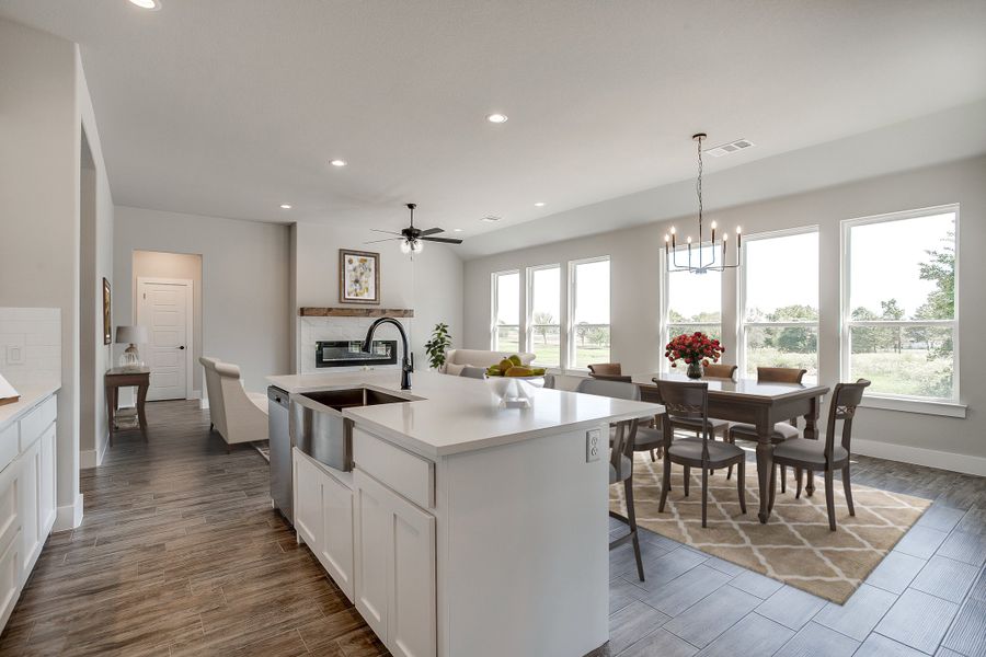 Representative furnished interior of a home built from the The Tulip by Kenmark Homes in Zion Valley, Poolville (Image 5).