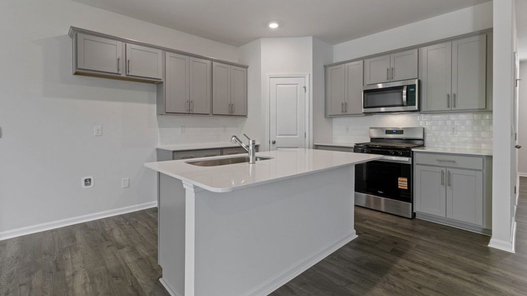 Furnished interior view inside a new home in Chapel Townes, Raleigh (Image 6). Furnished interior view inside a new home in Chapel Townes, Raleigh (Image 6).