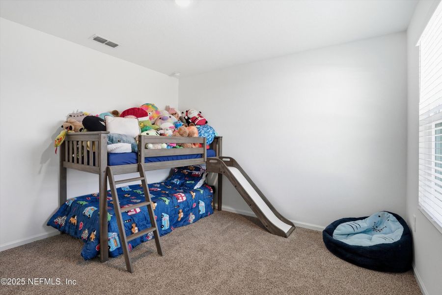 Furnished interior view inside a new home in Cross Creek Express, Green Cove Springs (Image 15).