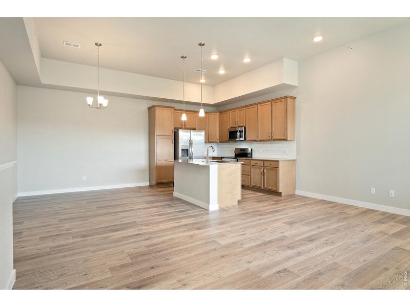 Furnished interior view inside a new home in The Lakes at Centerra, Loveland (Image 6).