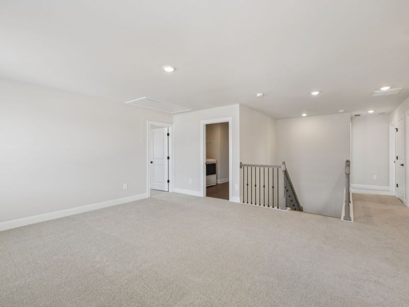 Spacious, unfurnished interior of a new home in Vines at Mill Creek - Estate Series, Braselton (Image 19). Spacious, unfurnished interior of a new home in Vines at Mill Creek - Estate Series, Braselton (Image 19).