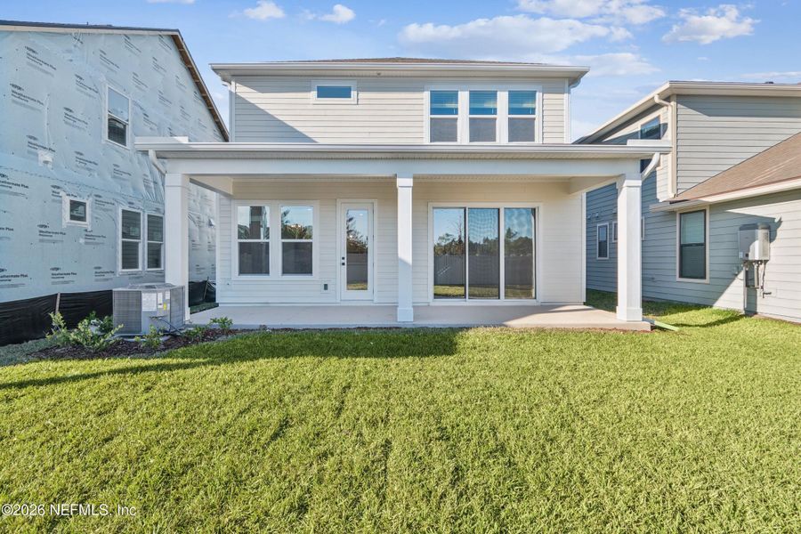 Exterior details and patio area of a home in Crosswinds 40’, Ponte Vedra (Image 2). Exterior details and patio area of a home in Crosswinds 40’, Ponte Vedra (Image 2).