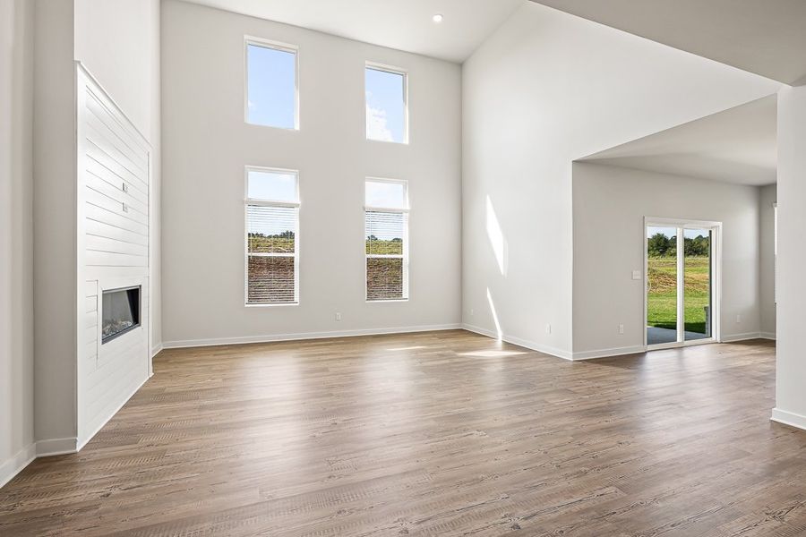 A room with white walls and windows.