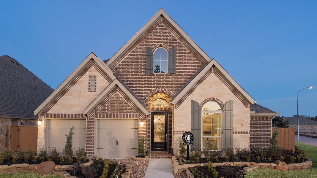 Representative exterior photo of a completed home built from the 2935W by Perry Homes in Meridiana, Rosharon, TX (Image 20).