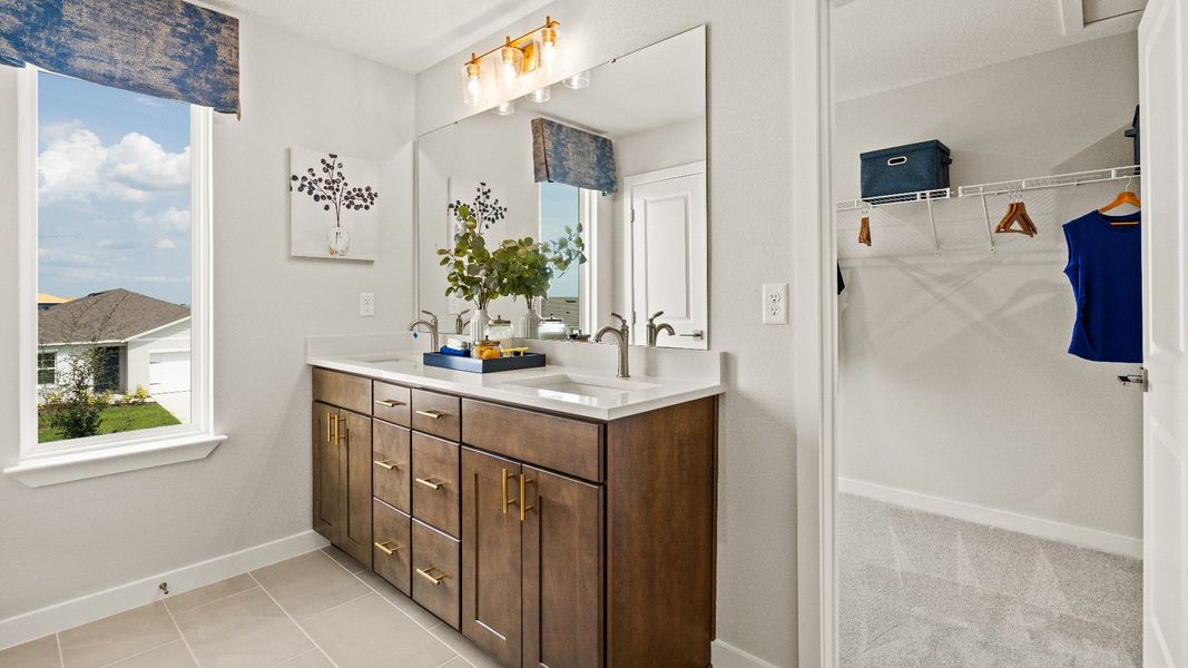 Primary Suite en suite Bathroom in the Model Highbourne by DRB Homes in Hamilton Bluff located in Haines City, FL. Primary Suite en suite Bathroom in the Model Highbourne by DRB Homes in Hamilton Bluff located in Haines City, FL.