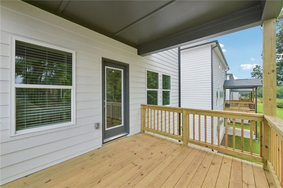 Exterior details and patio area of a home in Martin Springs - Estate Series, Lawrenceville (Image 4).