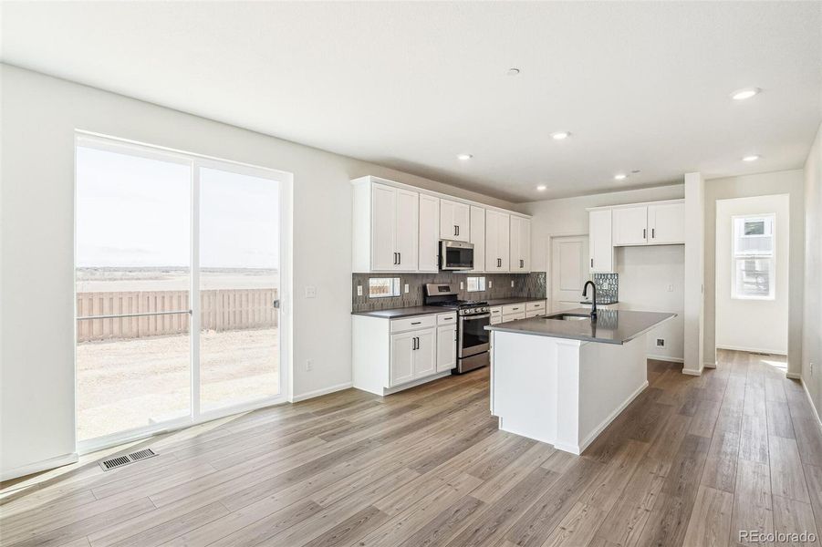 Furnished interior view inside a new home in , Commerce City (Image 3).