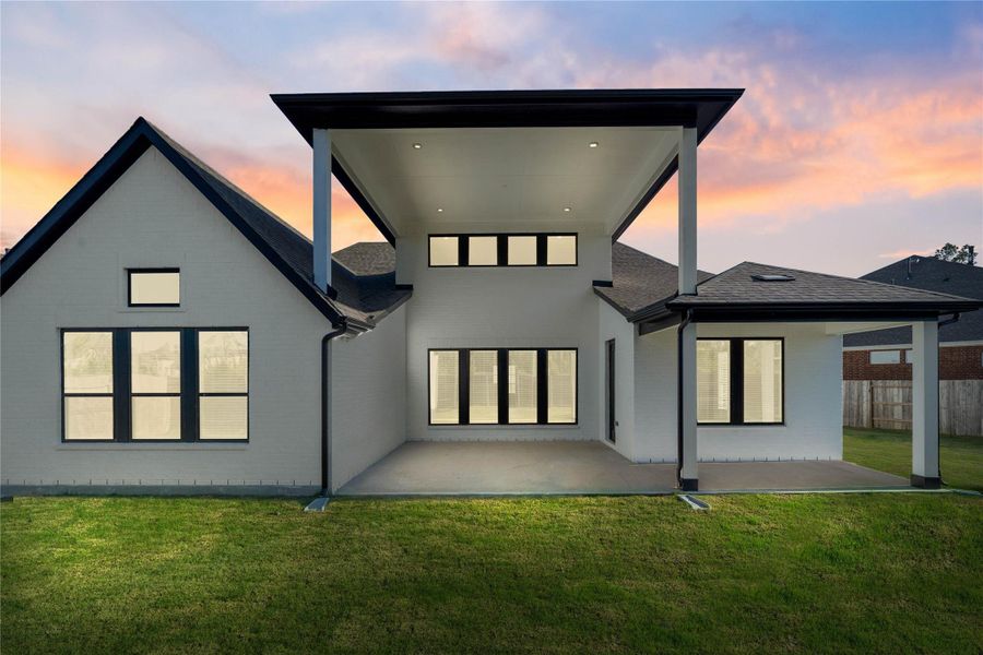 Exterior details and patio area of a home in ARTAVIA, Conroe (Image 4).