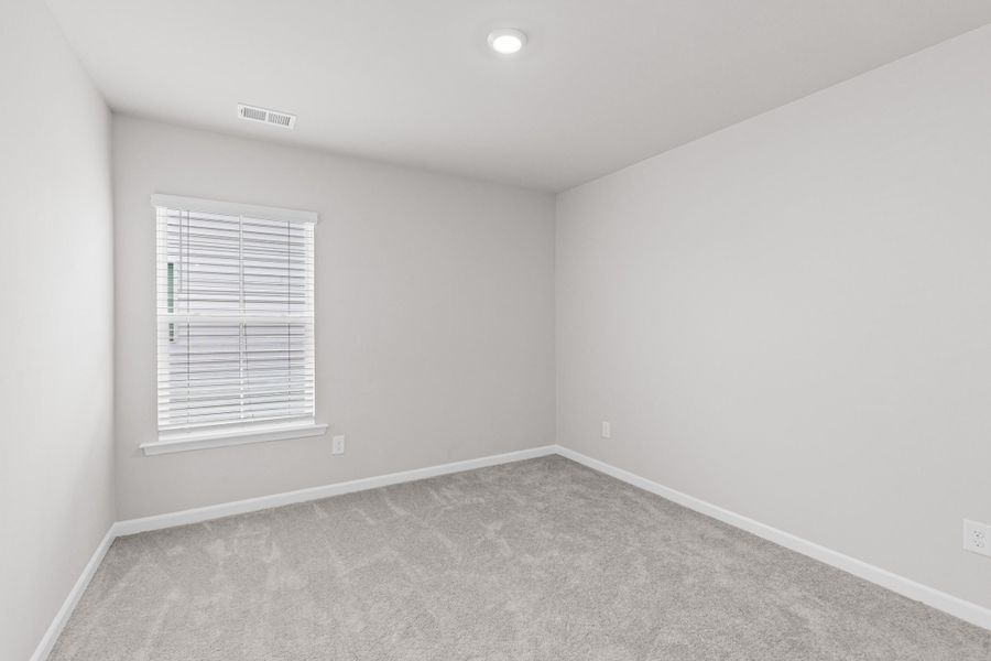 Spacious, unfurnished interior of a new home in Sweetgrass at Summers Corner, Summerville (Image 35).