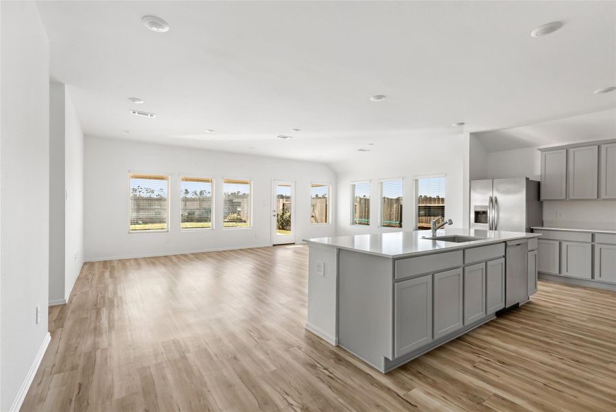 Look at all those windows!! Vinyl plank flooring throughout main areas of home. Refrigerator is included. Look at all those windows!! Vinyl plank flooring throughout main areas of home. Refrigerator is included.