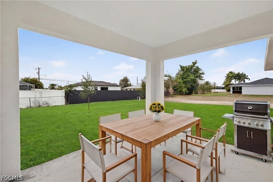 Exterior details and patio area of a home in Cape Coral, Cape Coral (Image 3).