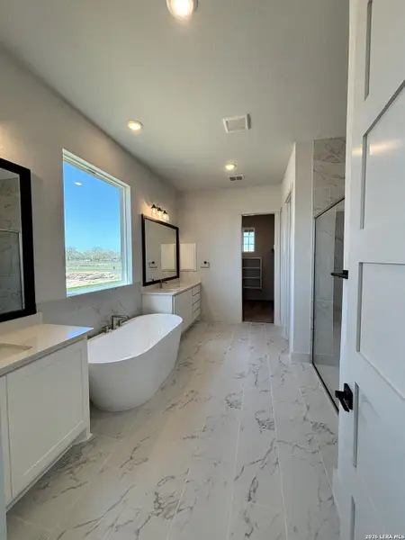 Furnished interior view inside a new home in Pradera Ridge, Floresville (Image 3).