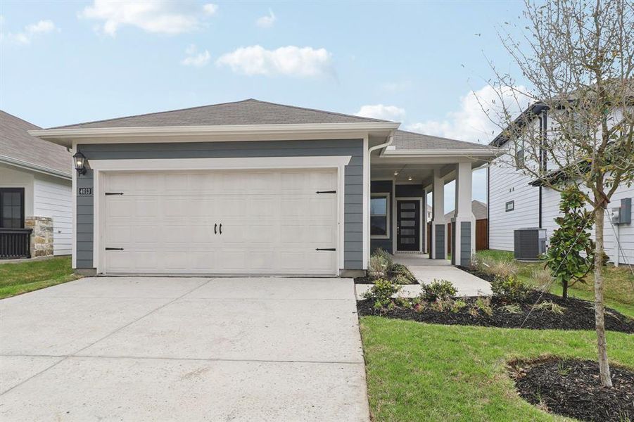 Front exterior of a new home in Lakehaven - Spring Series, Farmersville, TX, highlighting curb appeal (Image 1). Front exterior of a new home in Lakehaven - Spring Series, Farmersville, TX, highlighting curb appeal (Image 1).