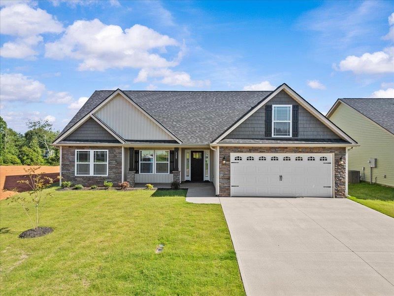 Front exterior of a new home in Mills Gin, Campobello, SC, highlighting curb appeal (Image 1).