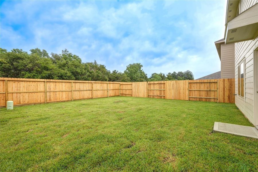 Exterior details and patio area of a home in Becker Landing, Hockley (Image 24).