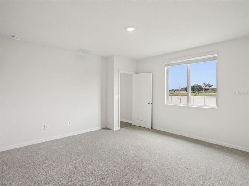 Spacious, unfurnished interior of a new home in Magnolia Bay - Classic Series, Nokomis (Image 12).