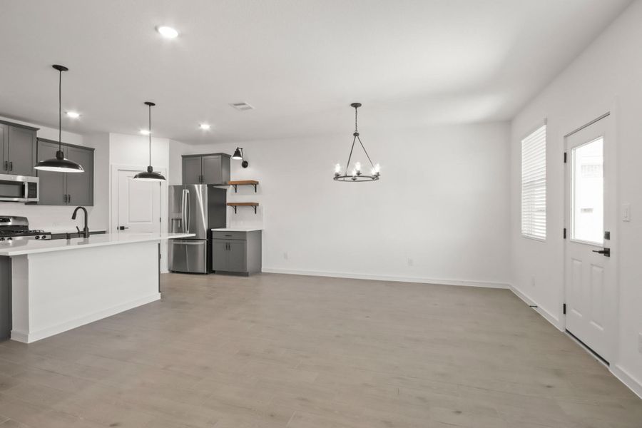 Sun-lit dining area and great room Sun-lit dining area and great room