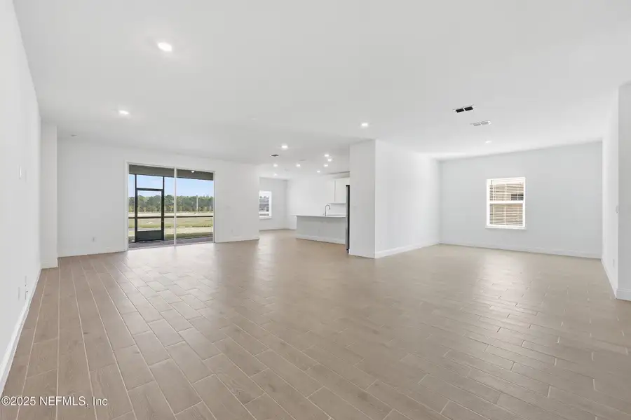 Spacious, unfurnished interior of a new home in Edenbrooke at Hyland Trail | 55+: Edenbrooke at Hyland Trail 60s, Green Cove Springs (Image 12). Spacious, unfurnished interior of a new home in Edenbrooke at Hyland Trail | 55+: Edenbrooke at Hyland Trail 60s, Green Cove Springs (Image 12).