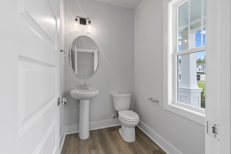 Representative furnished interior of a home built from the Blue Satin Sashes by Garman Homes in Spring Valley, Trinity (Image 7).