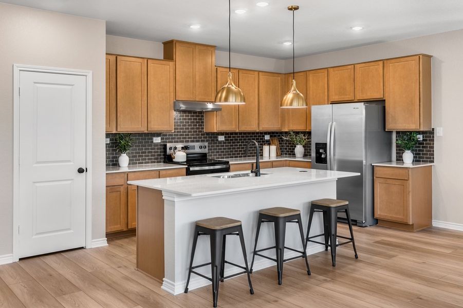 Representative furnished interior of a home built from the 2328 Modeled by KB Home in Nagel Crossing, San Antonio (Image 7).