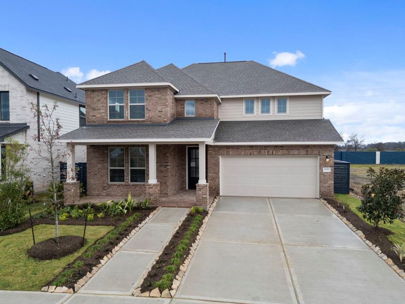 Front exterior of a new home in Austin Point, Richmond, TX, highlighting curb appeal (Image 22).