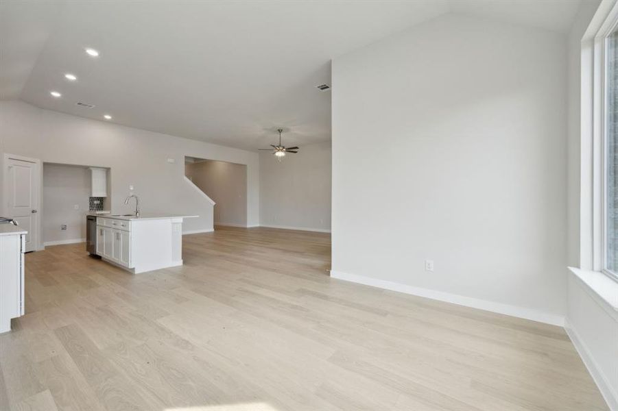 Looking into the kitchen and living room from the breakfast room