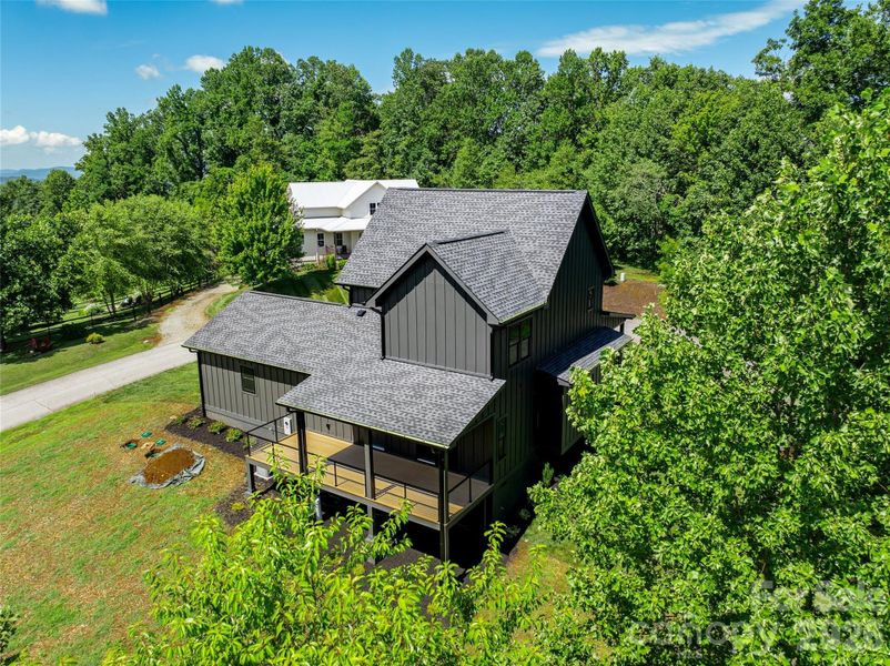Front exterior of a new home in , Hendersonville, NC, highlighting curb appeal (Image 26). Front exterior of a new home in , Hendersonville, NC, highlighting curb appeal (Image 26).
