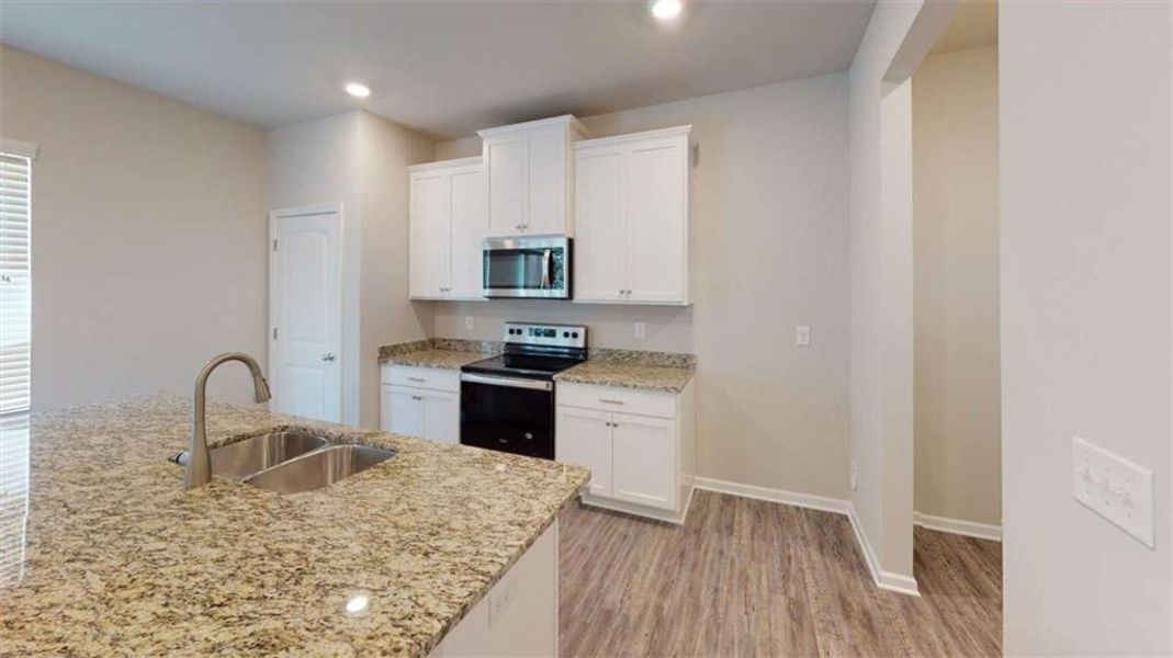 Furnished interior view inside a new home in , Conyers (Image 4).