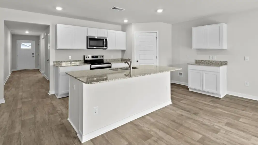 Furnished interior view inside a new home in Vineyard Trail, Jacksonville (Image 6).