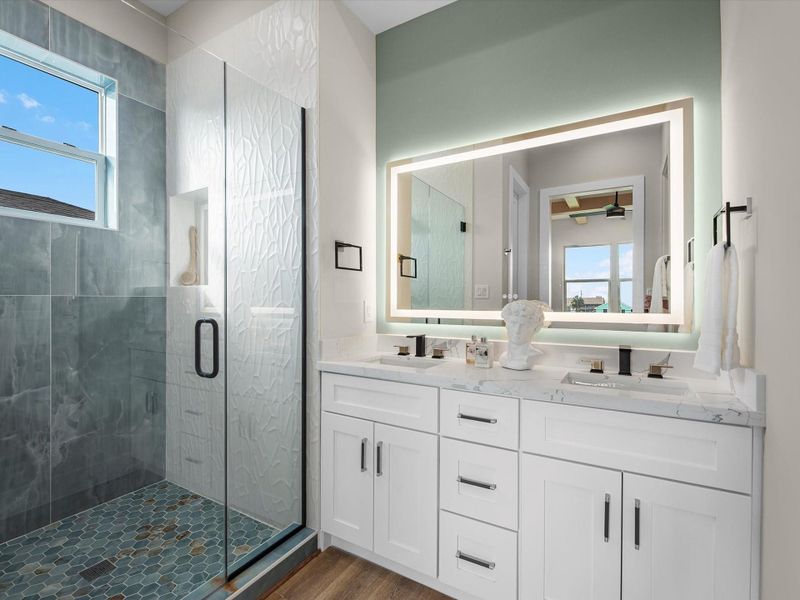 Alternate view of the walk-in shower and primary bathroom. Alternate view of the walk-in shower and primary bathroom.