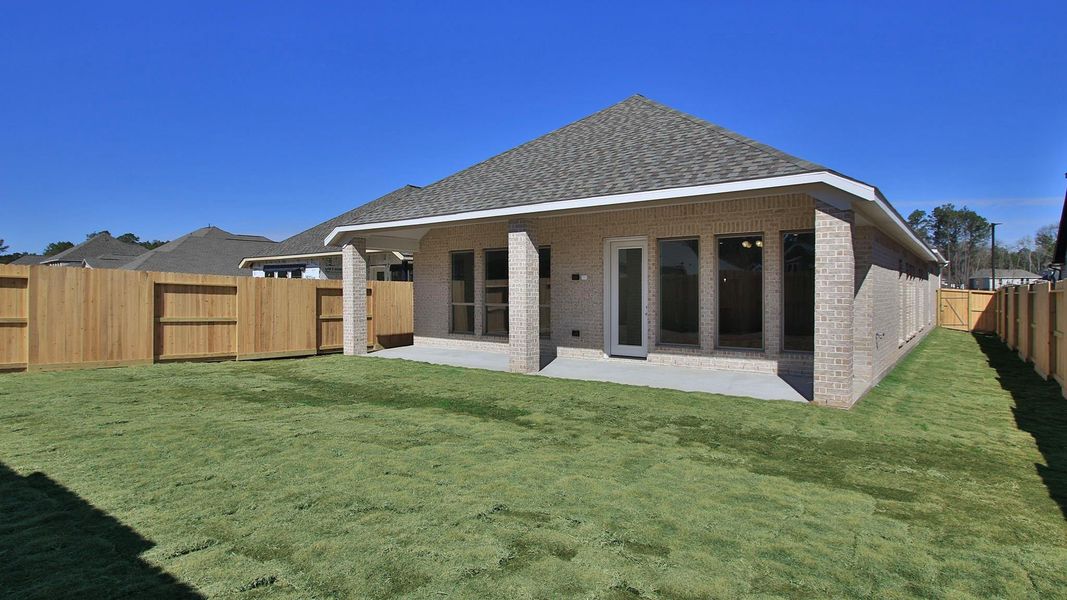 Exterior details and patio area of a home in The Highlands, Porter (Image 3).