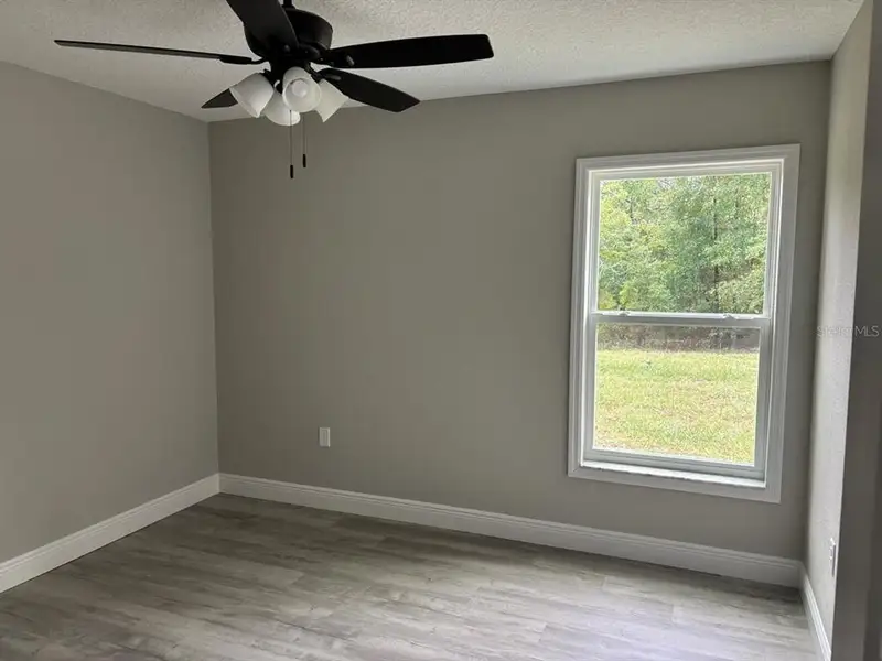 Spacious, unfurnished interior of a new home in , Dunnellon (Image 11).