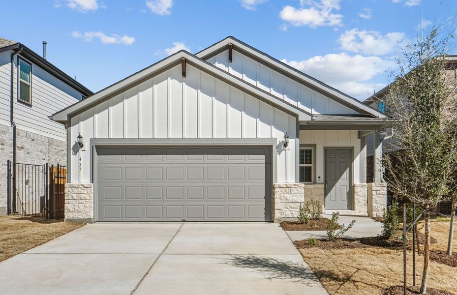 Front exterior of a new home in Saddleback at Santa Rita Ranch, Liberty Hill, TX, highlighting curb appeal (Image 20).