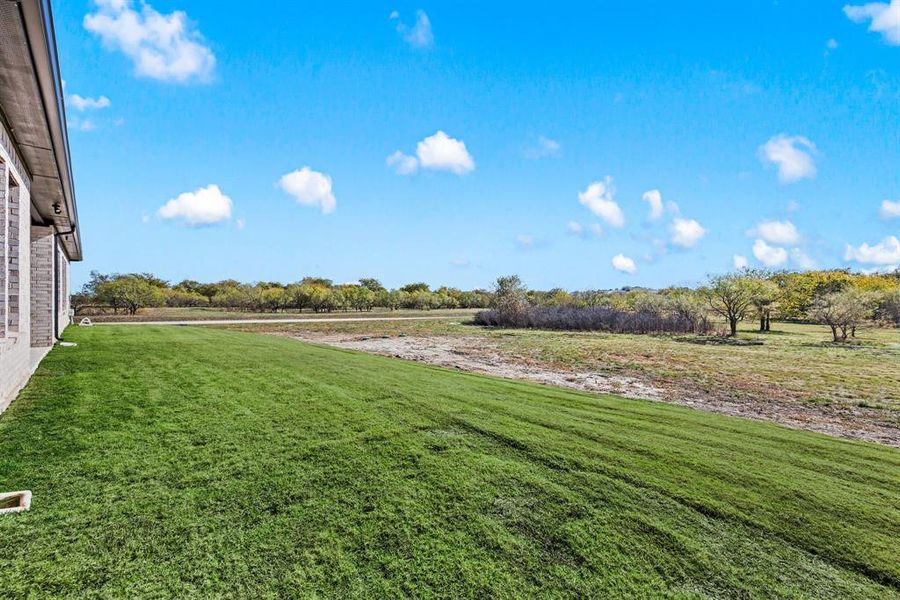 Exterior details and patio area of a home in Rolling Creek Ranch, Aledo (Image 24). Exterior details and patio area of a home in Rolling Creek Ranch, Aledo (Image 24).