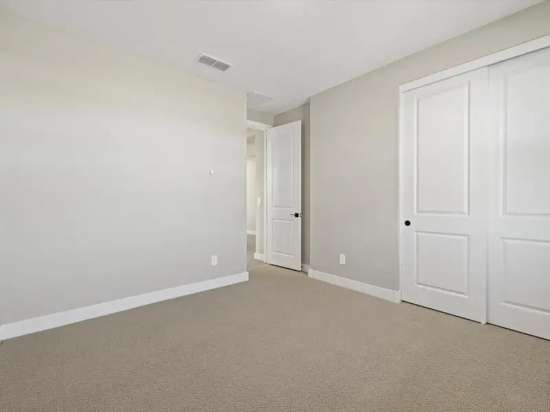 Spacious, unfurnished interior of a new home in White Tank Foothills Reserve Series, Waddell (Image 17). Spacious, unfurnished interior of a new home in White Tank Foothills Reserve Series, Waddell (Image 17).