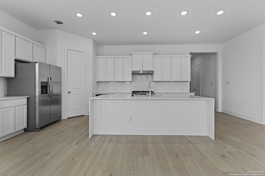 Furnished interior view inside a new home in , New Braunfels (Image 6).