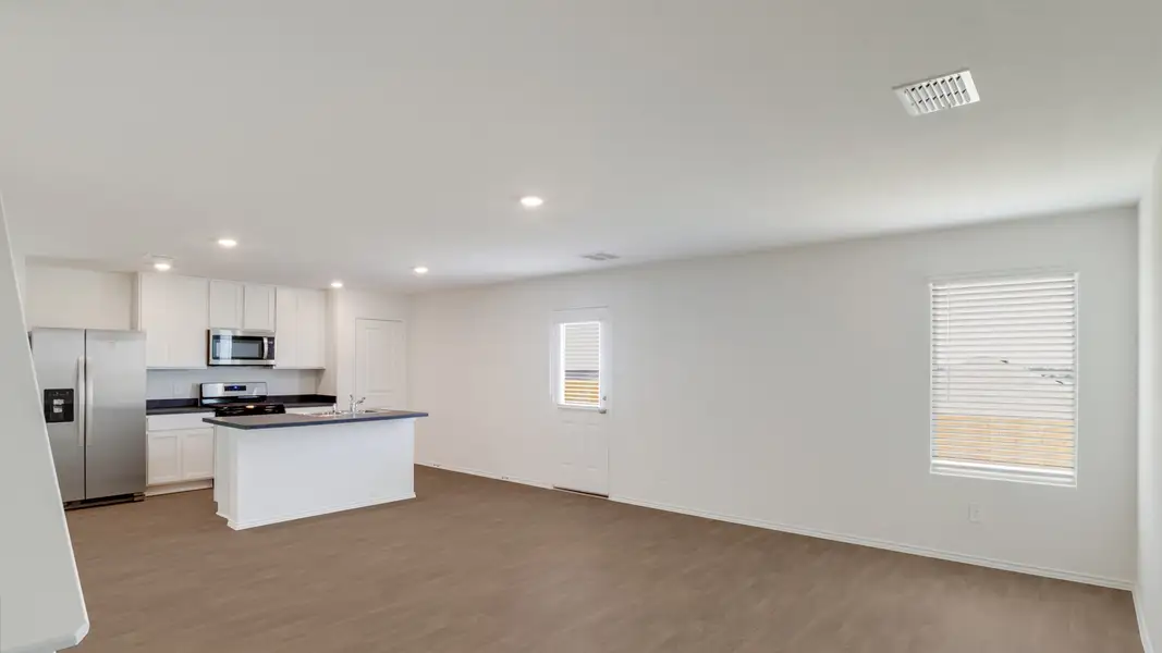 Representative unfurnished interior of a home built from the The Franklin by D.R. Horton in Watermill, Uhland (Image 6).