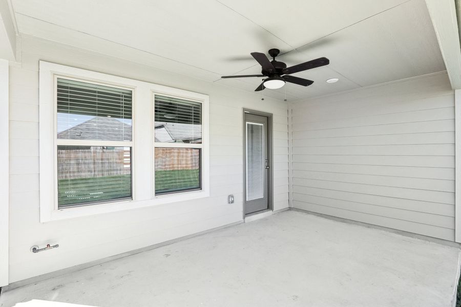Back exterior of the Oleander floorplan at a Meritage Homes community. Back exterior of the Oleander floorplan at a Meritage Homes community.
