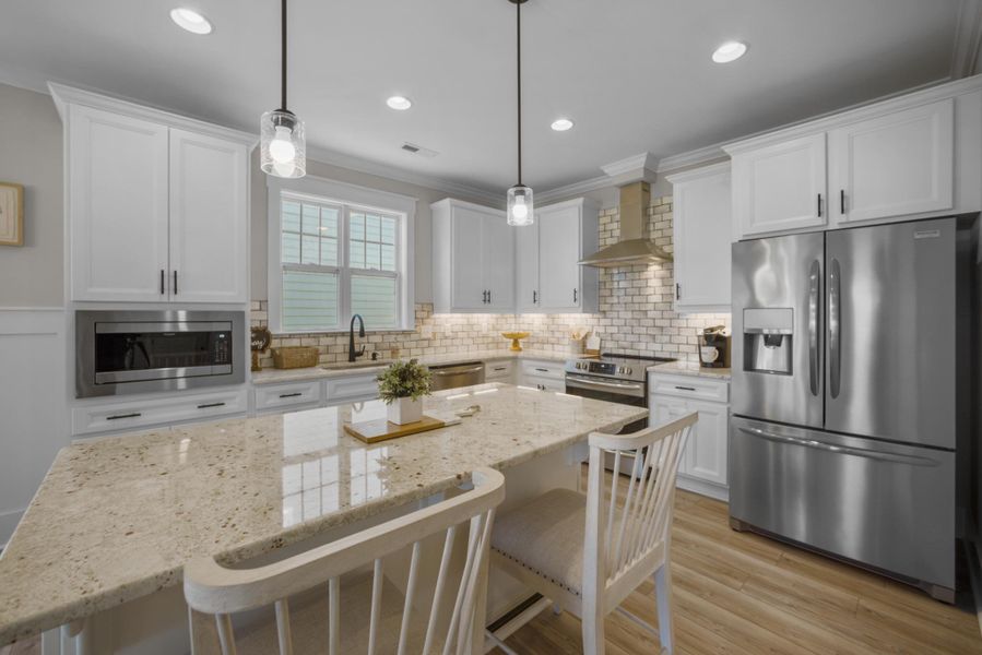 Representative furnished interior of a home built from the Fletcher by Bill Clark Homes in Riverside Cove, Wilmington (Image 5).