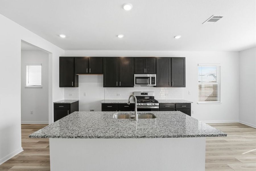 Furnished interior view inside a new home in Longview, Del Valle (Image 4).