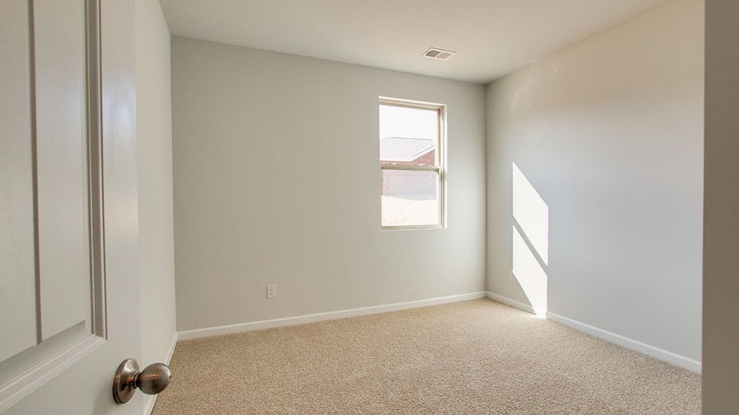 Spacious, unfurnished interior of a new home in The Parks, White House (Image 21).