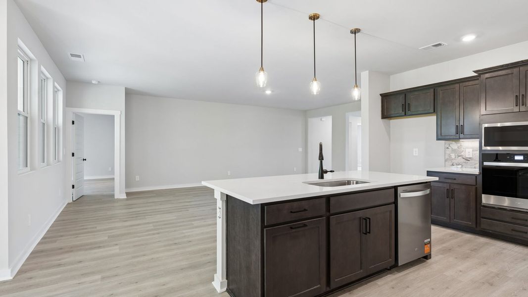 Representative furnished interior of a home built from the Ansley by D.R. Horton in Harvest Point, Spring Hill (Image 15).
