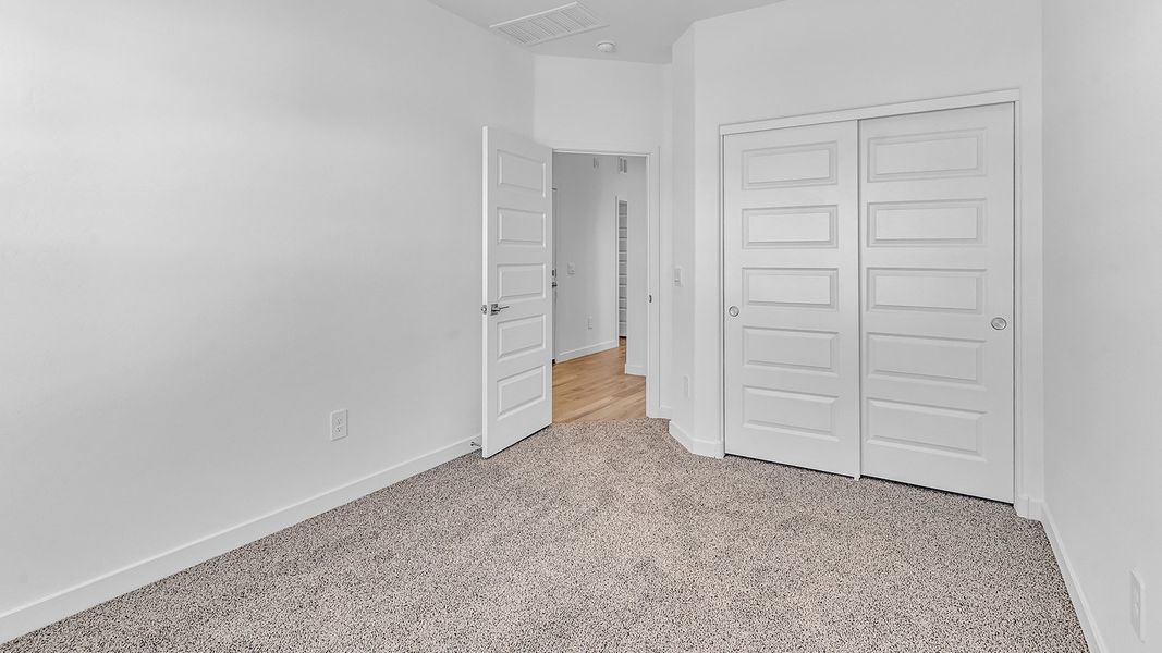 Representative unfurnished interior of a home built from the Parker by D.R. Horton in The Oasis at Rocking K, Vail (Image 19).