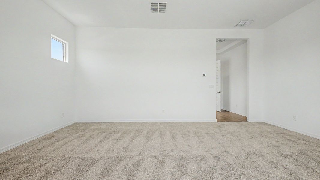 Representative furnished interior of a home built from the Granada by DRB Homes in Windrose, Waddell (Image 10).