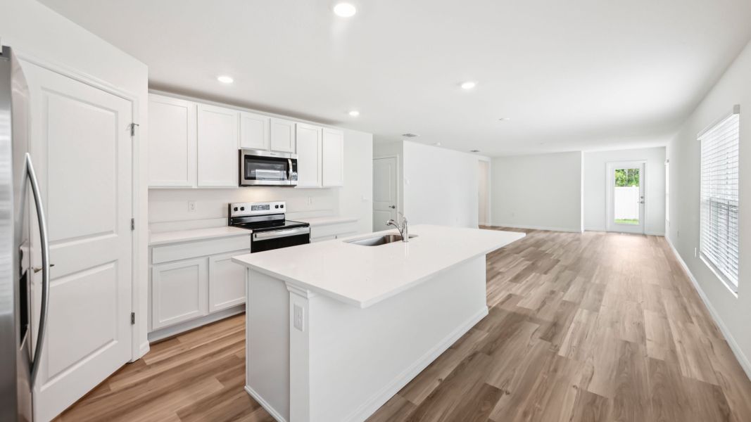Representative furnished interior of a home built from the HARPER by D.R. Horton in Sherman Oaks, Brooksville (Image 13).